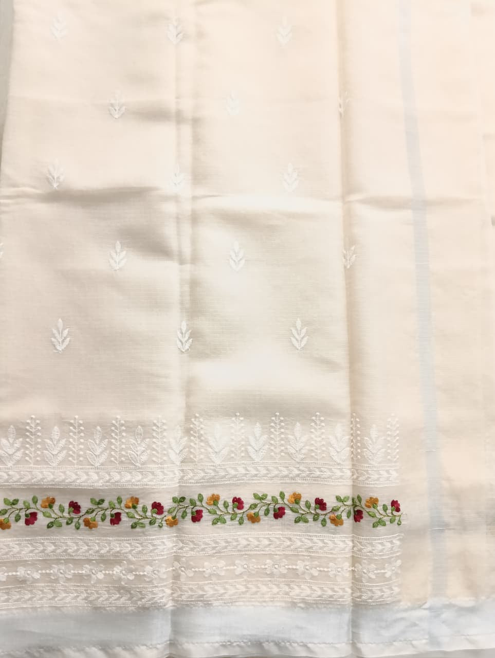light cream Kota Saree with floral embroidery