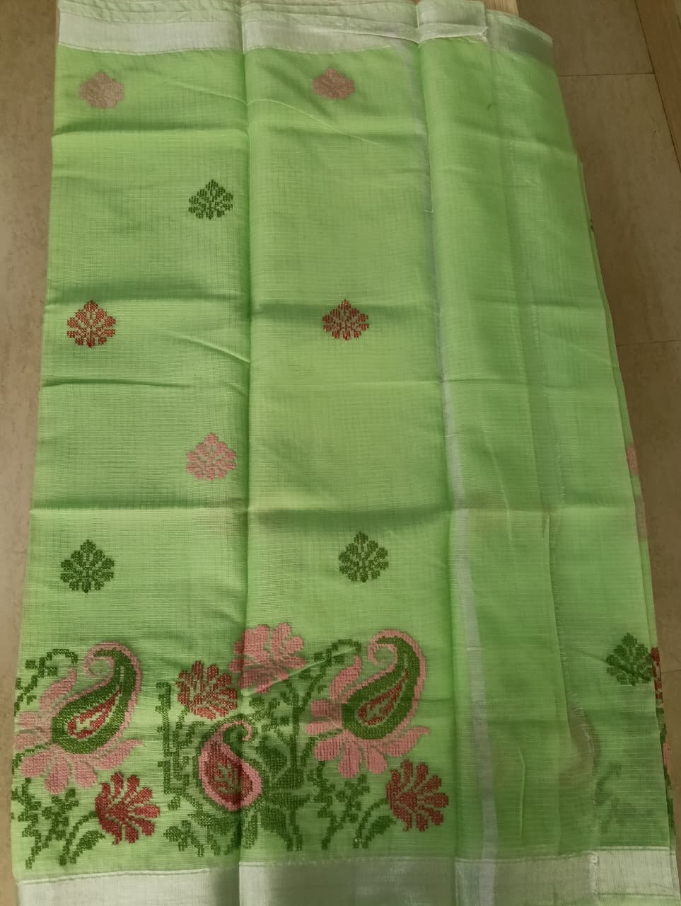 Green Kota Saree with embrioded floral motifs