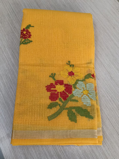 Yellow Kota Saree with embrioded floral motifs