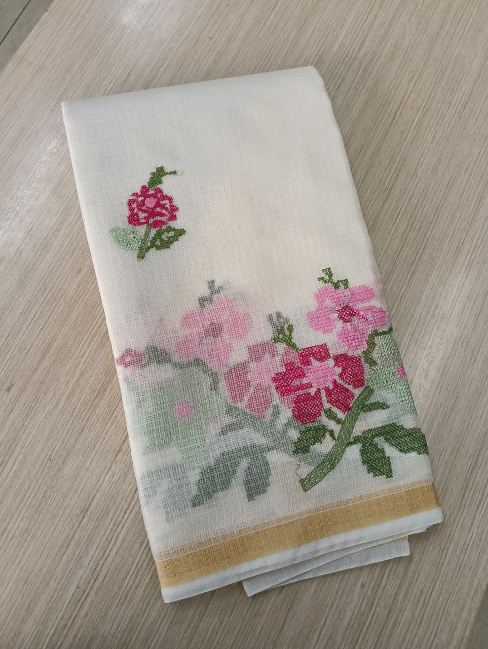 light cream Kota Saree with embrioded floral motifs