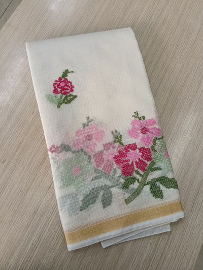 light cream Kota Saree with embrioded floral motifs