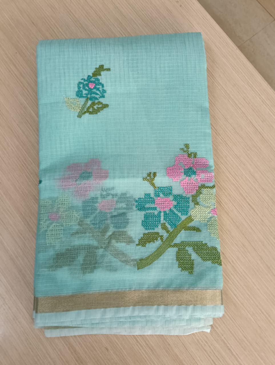 Pastel Green Kota Saree with embrioded floral motifs