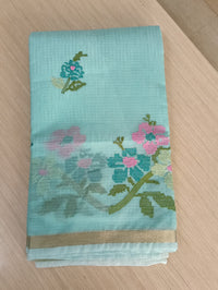Pastel Green Kota Saree with embrioded floral motifs