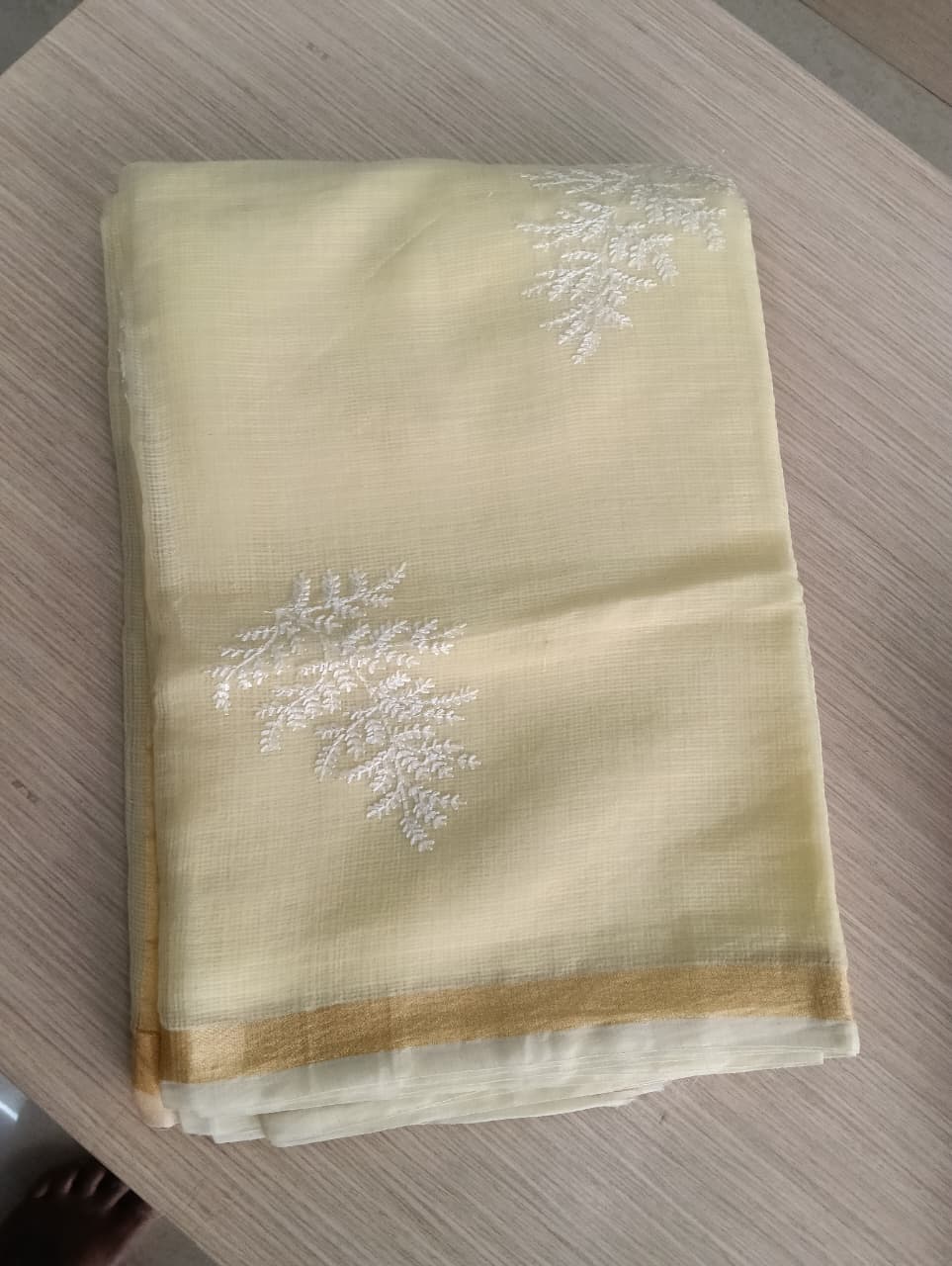 Light Yellow Kota Saree with embrioded floral motifs